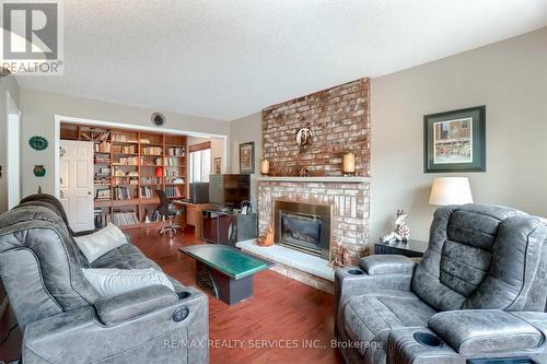 104 Lord Simcoe Dr, Brampton, ON - Indoor Photo Showing Living Room With Fireplace