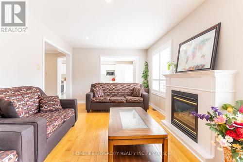 3 Dragon Tree Crescent, Brampton, ON - Indoor Photo Showing Living Room With Fireplace