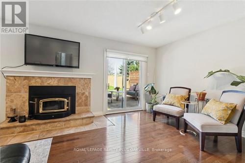 2543 Cavendish Drive, Burlington, ON - Indoor Photo Showing Living Room With Fireplace