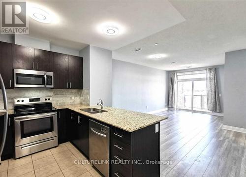 #710 -7325 Markham Rd, Markham, ON - Indoor Photo Showing Kitchen With Stainless Steel Kitchen With Double Sink With Upgraded Kitchen