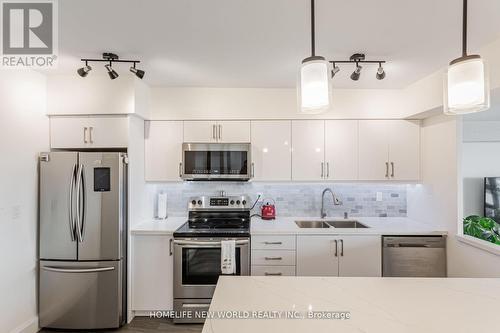 #1008 -177 Linus Rd, Toronto, ON - Indoor Photo Showing Kitchen With Double Sink