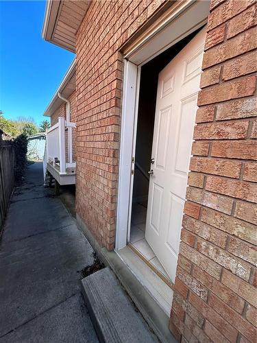 Side entrance door - 23 Jeremy Street|Unit #Lower Unit, Hamilton, ON - Outdoor With Exterior