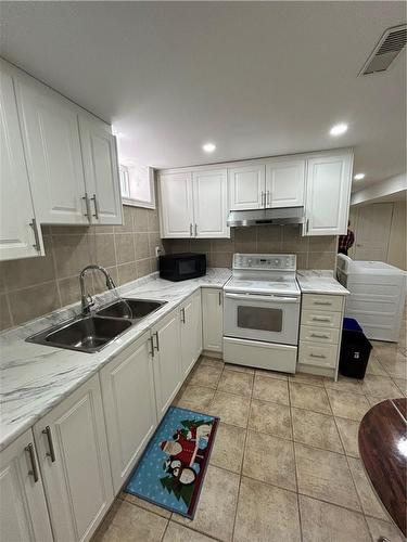 Eat in Kitchen - 23 Jeremy Street|Unit #Lower Unit, Hamilton, ON - Indoor Photo Showing Kitchen With Double Sink