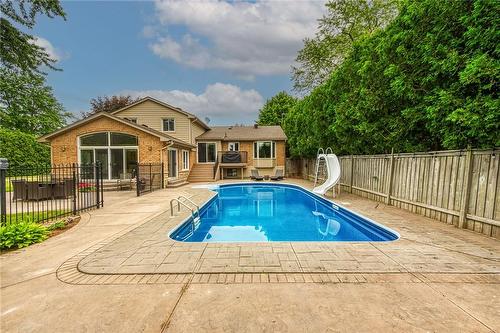 Heated pool with depths of 3.5 feet to 5.5 feet - 861 Centre Road, Flamborough, ON - Outdoor With In Ground Pool