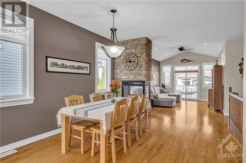 70 Black Bear Way, Ottawa, ON - Indoor Photo Showing Dining Room With Fireplace