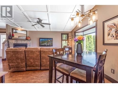 664 Patterson Avenue, Kelowna, BC - Indoor Photo Showing Dining Room With Fireplace