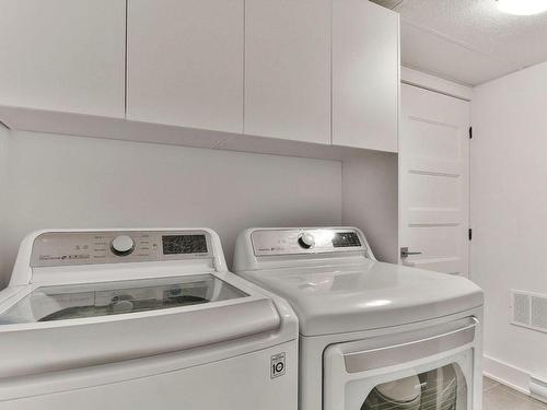 Powder room - 1584 Rue St-André, L'Assomption, QC - Indoor Photo Showing Laundry Room