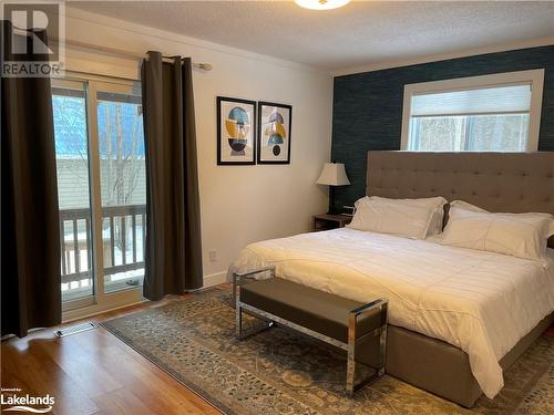 Larger Bedroom - 40 Bridgeview Lane, Huntsville, ON - Indoor Photo Showing Bedroom