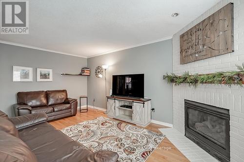 30 Culotta Dr, Hamilton, ON - Indoor Photo Showing Living Room With Fireplace