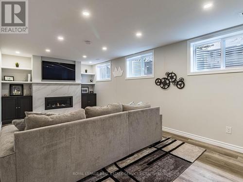 67 Centre St S, Brampton, ON - Indoor Photo Showing Basement With Fireplace