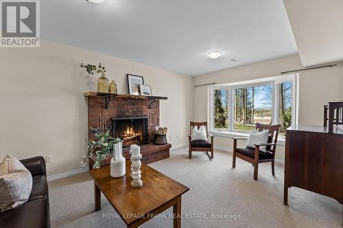 1007 Stewart 12Th Line, Cavan Monaghan, ON - Indoor Photo Showing Living Room With Fireplace