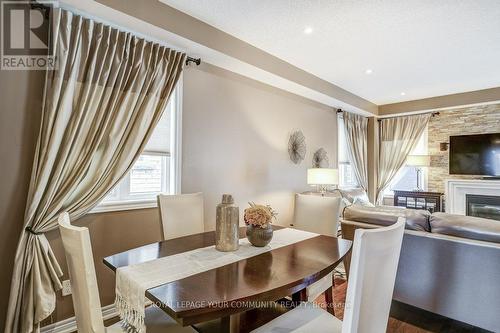76 Augustine Ave, Richmond Hill, ON - Indoor Photo Showing Dining Room With Fireplace