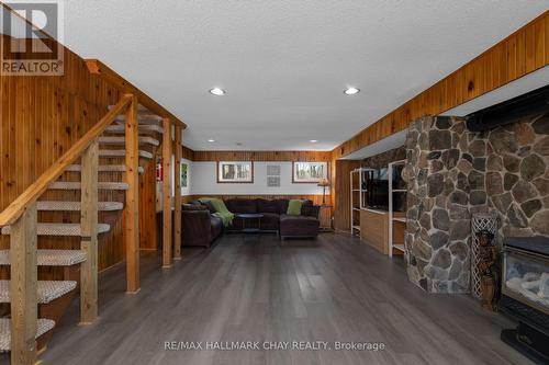1166 Gill Road, Springwater, ON - Indoor With Fireplace
