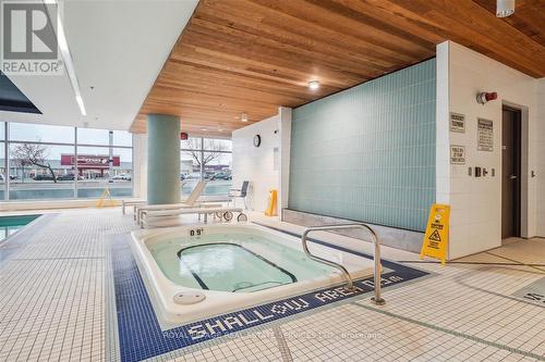 #1807 -65 Speers Rd, Oakville, ON - Indoor Photo Showing Other Room With In Ground Pool