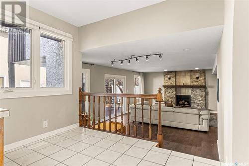 75 Green Meadow Road, Regina, SK - Indoor Photo Showing Other Room With Fireplace