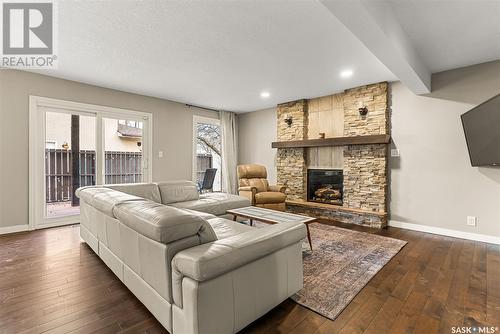 75 Green Meadow Road, Regina, SK - Indoor Photo Showing Living Room With Fireplace