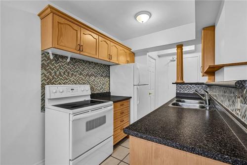 851 Queenston Road|Unit #607, Hamilton, ON - Indoor Photo Showing Kitchen With Double Sink