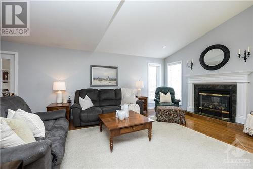502 Quart Court, Winchester, ON - Indoor Photo Showing Living Room With Fireplace