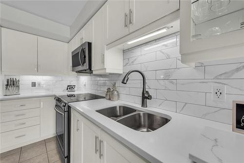 119 Donald Bell Drive, Binbrook, ON - Indoor Photo Showing Kitchen With Double Sink With Upgraded Kitchen
