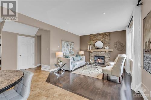 69 Chanonhouse Drive, Ottawa, ON - Indoor Photo Showing Living Room With Fireplace