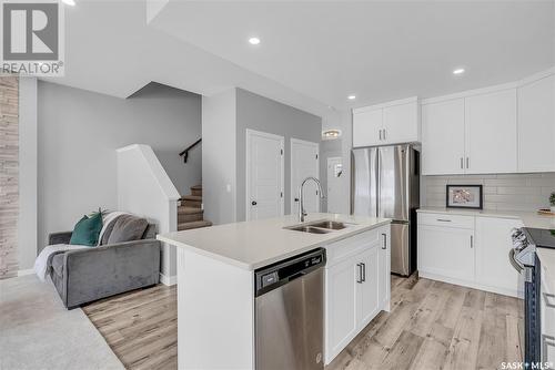 #10 525 Mahabir Lane, Saskatoon, SK - Indoor Photo Showing Kitchen With Stainless Steel Kitchen With Double Sink With Upgraded Kitchen