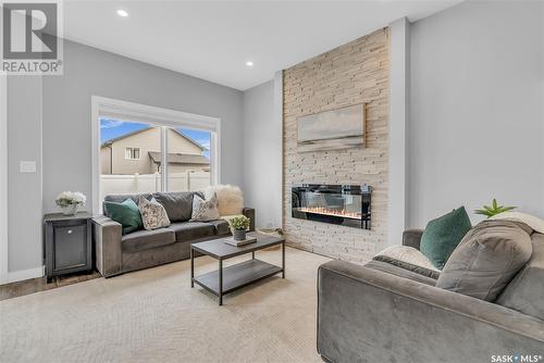 #10 525 Mahabir Lane, Saskatoon, SK - Indoor Photo Showing Living Room With Fireplace