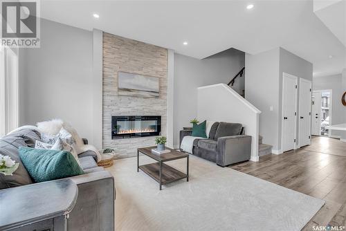 #10 525 Mahabir Lane, Saskatoon, SK - Indoor Photo Showing Living Room With Fireplace