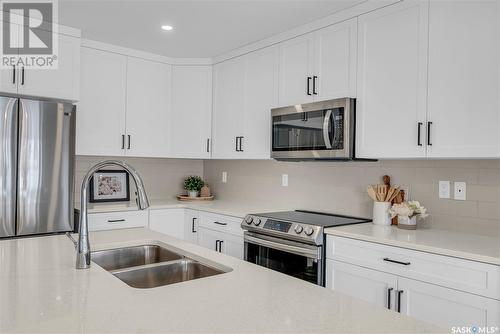 #10 525 Mahabir Lane, Saskatoon, SK - Indoor Photo Showing Kitchen With Stainless Steel Kitchen With Double Sink With Upgraded Kitchen