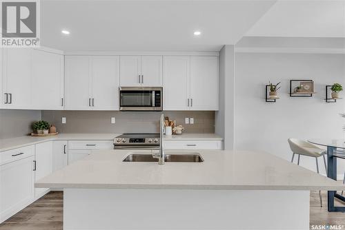 #10 525 Mahabir Lane, Saskatoon, SK - Indoor Photo Showing Kitchen With Double Sink With Upgraded Kitchen