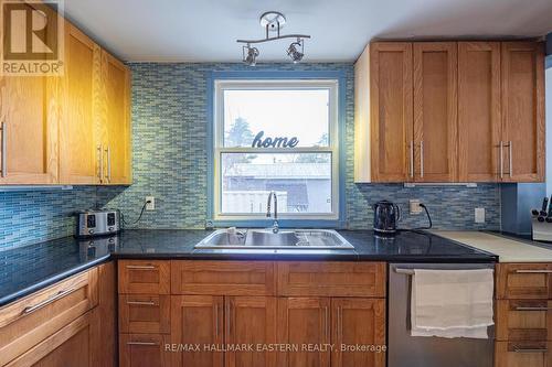 7066 Waverly Street, Hamilton Township, ON - Indoor Photo Showing Kitchen With Double Sink