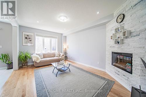 121 Decast Cres, Markham, ON - Indoor Photo Showing Living Room With Fireplace