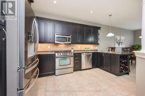 14 James Arnott Crescent, Orangeville, ON - Indoor Photo Showing Kitchen With Stainless Steel Kitchen