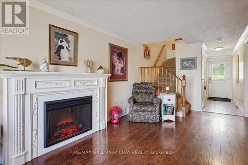 2 Birchshire Dr, Barrie, ON - Indoor Photo Showing Living Room With Fireplace