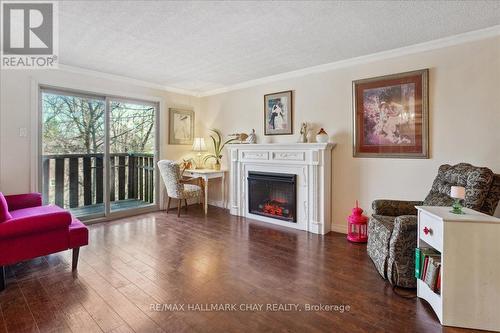 2 Birchshire Dr, Barrie, ON - Indoor Photo Showing Living Room With Fireplace