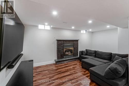 115 Eagleridge Dr, Brampton, ON - Indoor Photo Showing Basement With Fireplace