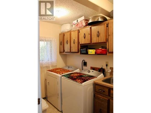 3152 6 Highway, Slocan Park, BC - Indoor Photo Showing Laundry Room