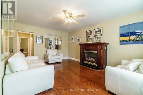 899 Cumberland Ave, Peterborough, ON - Indoor Photo Showing Living Room With Fireplace