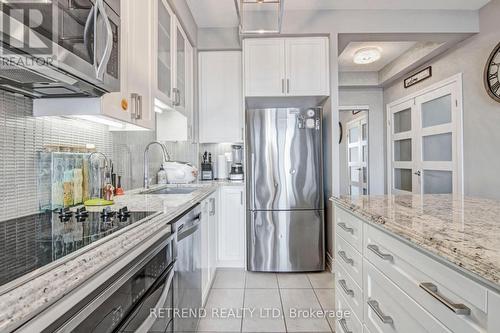 #307B -9090 Yonge St, Richmond Hill, ON - Indoor Photo Showing Kitchen With Stainless Steel Kitchen With Upgraded Kitchen