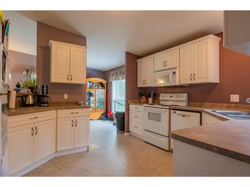 2418 Highway 6, Slocan Park, BC - Indoor Photo Showing Kitchen With Double Sink