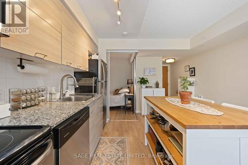 1305 - 20 Joe Shuster Way, Toronto, ON - Indoor Photo Showing Kitchen With Upgraded Kitchen