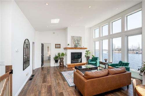 15 Odin'S Way, Gimli, MB - Indoor Photo Showing Living Room With Fireplace