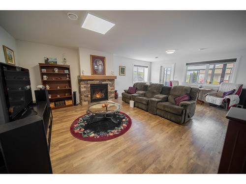 102 18Th Street S, Cranbrook, BC - Indoor Photo Showing Living Room With Fireplace