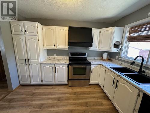 9 Atkins Ave, Kirkland Lake, ON - Indoor Photo Showing Kitchen With Double Sink
