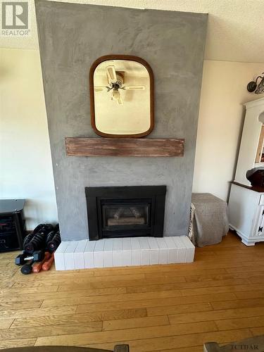 9 Atkins Ave, Kirkland Lake, ON - Indoor Photo Showing Living Room With Fireplace