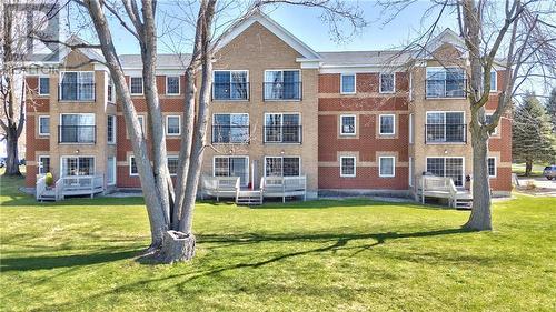 Condo unit is in middle 2nd level ... - 19 John Street E Unit#203, Perth, ON - Outdoor With Facade