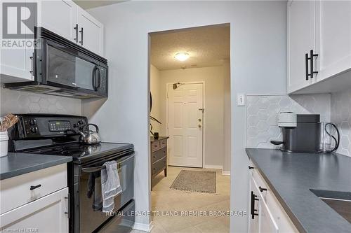 #702 -95 Base Line Rd W, London, ON - Indoor Photo Showing Kitchen