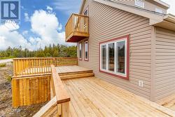 Front Deck and Juliet balcony facing Lake Huron. - 