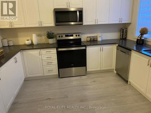 #102 -250 Finch Ave, Pickering, ON - Indoor Photo Showing Kitchen With Stainless Steel Kitchen