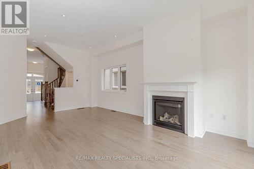 3936 Leonardo St, Burlington, ON - Indoor Photo Showing Living Room With Fireplace