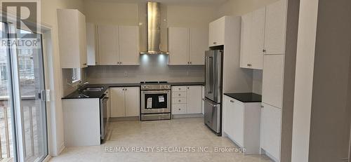 3936 Leonardo St, Burlington, ON - Indoor Photo Showing Kitchen With Stainless Steel Kitchen With Double Sink